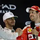 World Champion Nico Rosberg (GER) Mercedes AMG F1 celebrates on the podium with Sebastian Vettel (GER) Ferrari and Lewis Hamilton (GBR) Mercedes AMG F1 at Formula One World Championship, Rd21, Abu Dhabi Grand Prix, Race, Yas Marina Circuit, Abu Dhabi, UAE, Sunday 27 November 2016. &copy; Sutton Images